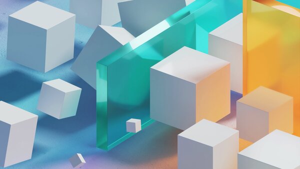 Abstrakte 3D-Grafik mit schwebenden Würfeln in Weiß sowie halbtransparenten Farbflächen in Türkis und Orange. Die Szene ist weich ausgeleuchtet und wirkt futuristisch und spielerisch.