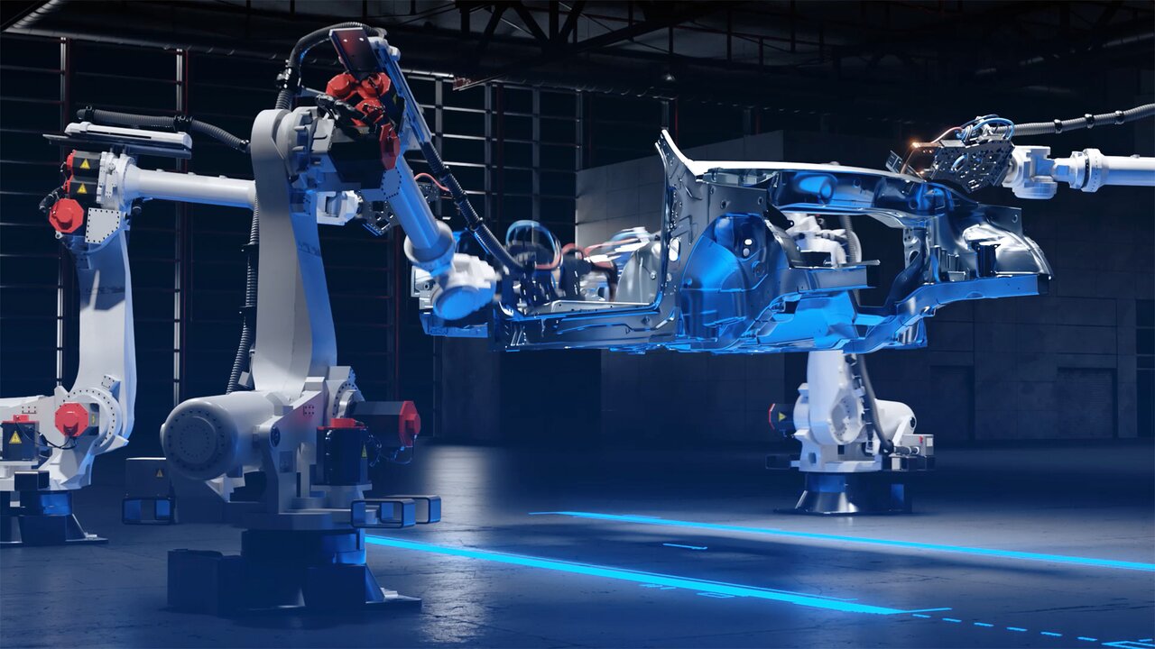 Schweißroboter arbeiten an der Unterseite einer Autokarosserie.