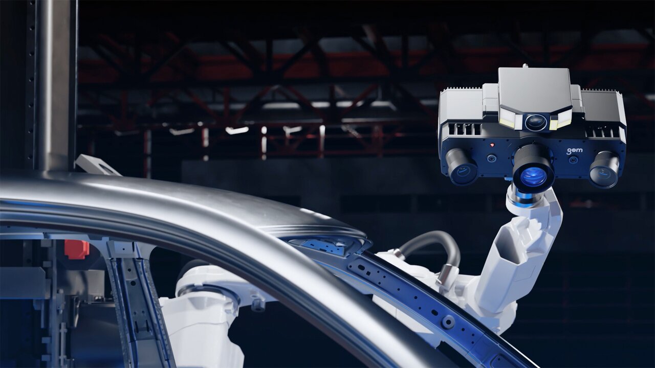 Roboter mit 3D-Scanner untersucht die Außenseite eines Fahrzeugrahmens.
