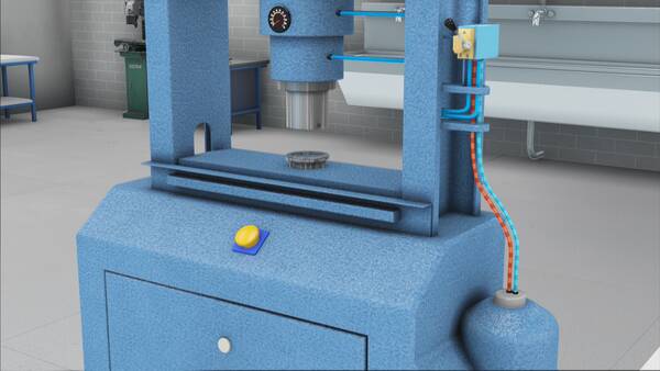 Nahaufnahme einer blauen hydraulischen Presse mit gelbem Bedienknopf und Luftleitungen.