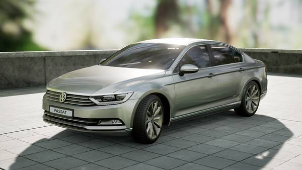 Silberner VW Passat auf gepflastertem Platz mit unscharfem, grünem Hintergrund.